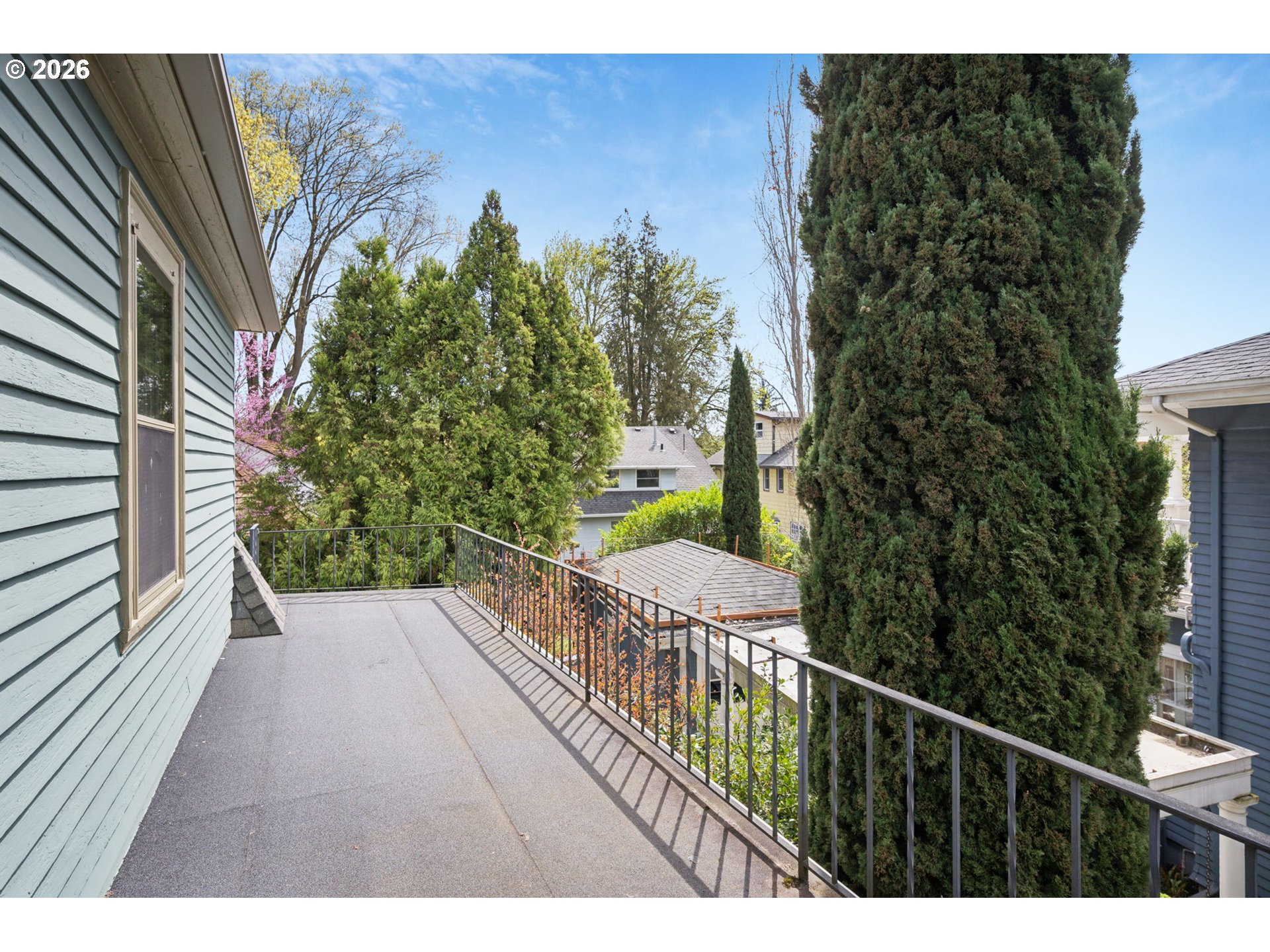 3434 Northeast Peerless Place Portland, OR 97232 - Photo 25 of 40 a view of a balcony with wooden floor
