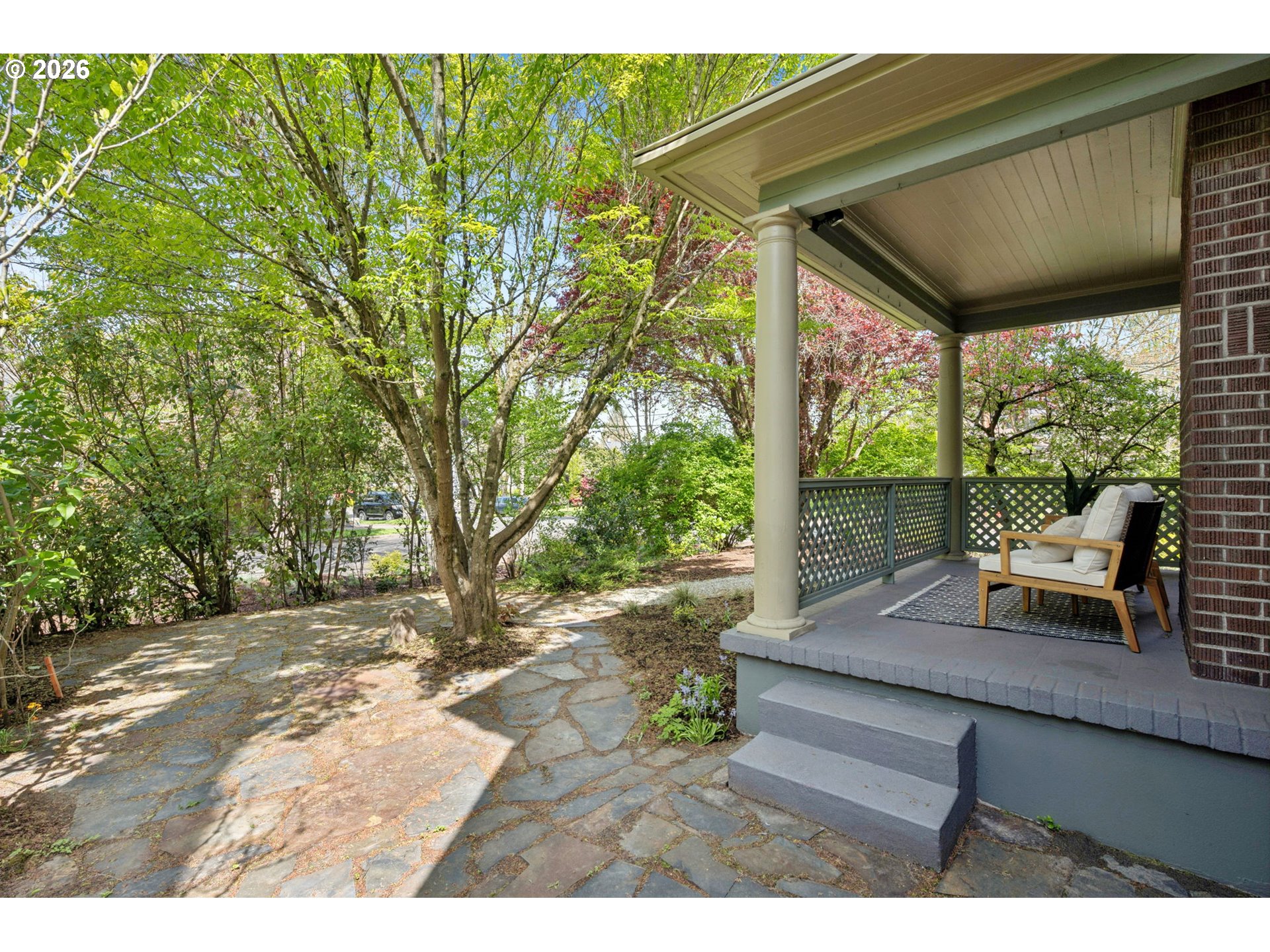 3434 Northeast Peerless Place Portland, OR 97232 - Photo 34 of 40 a view of a patio with table and chairs with wooden floor and fence