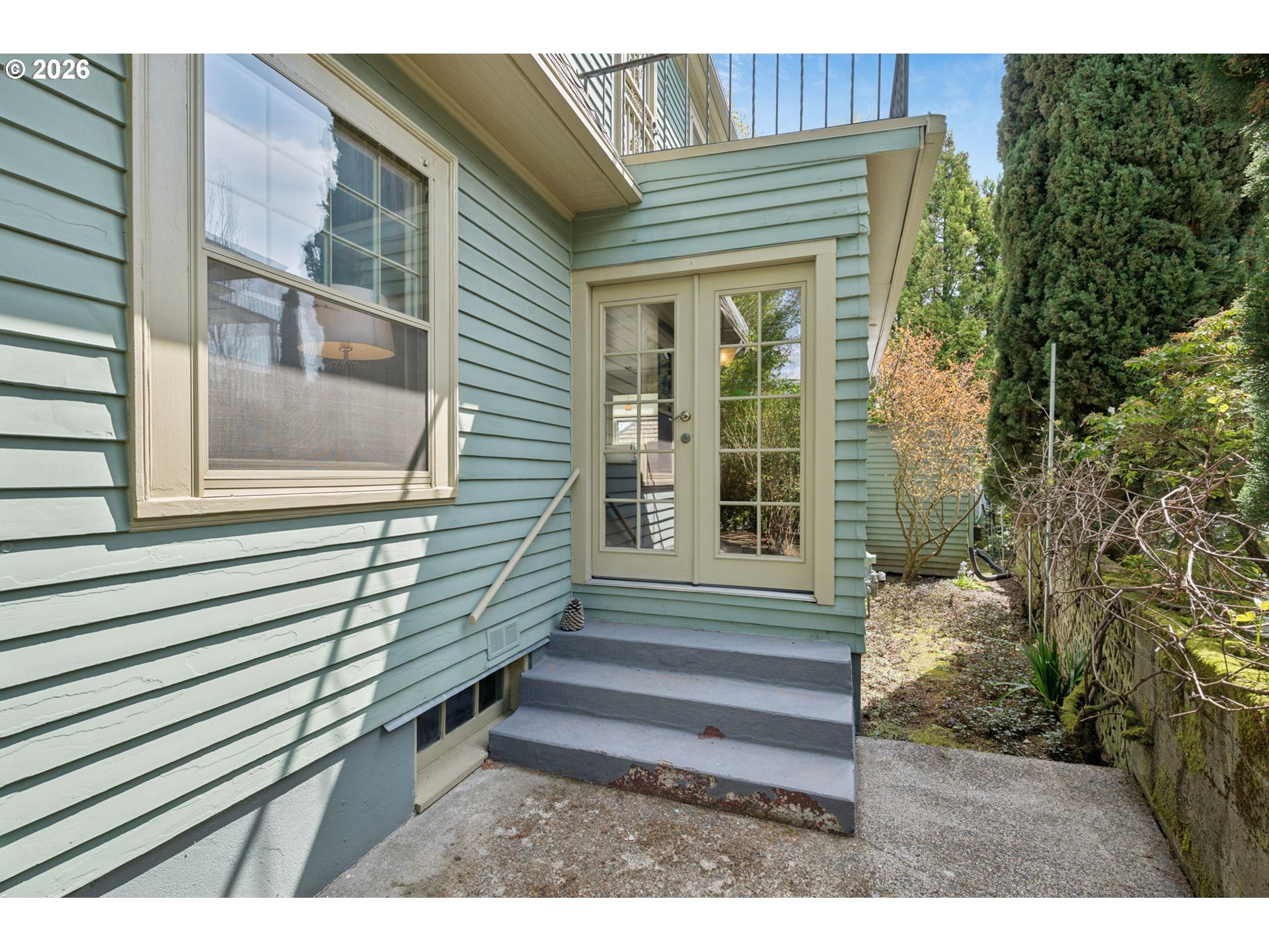 3434 Northeast Peerless Place Portland, OR 97232 - Photo 38 of 40 a view of a house with a door and a window