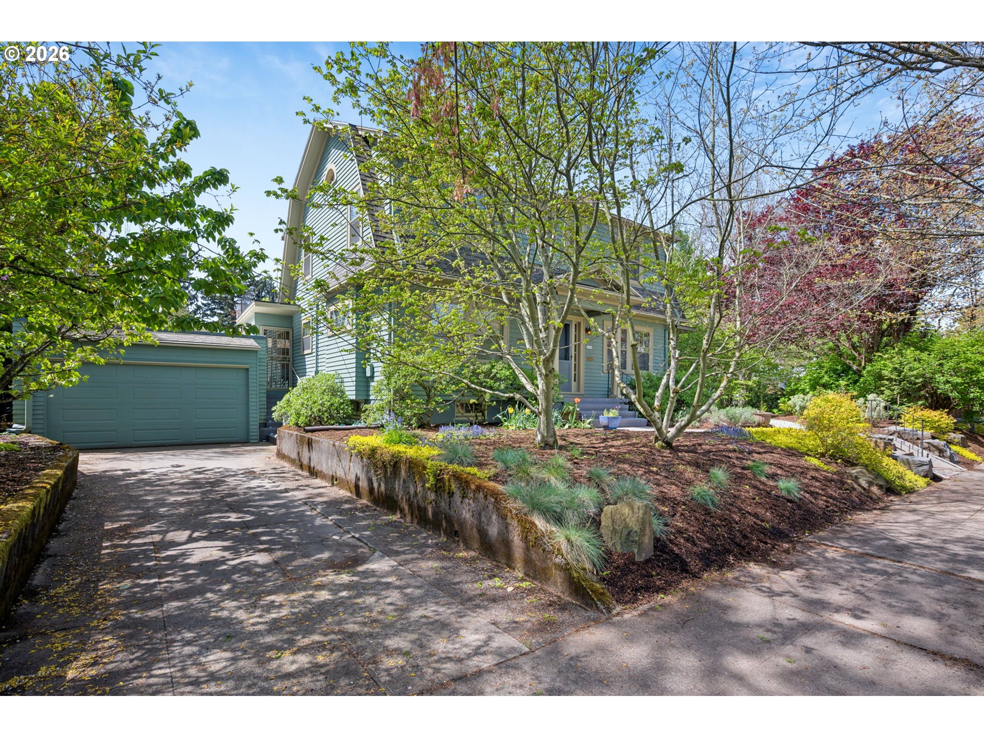 3434 Northeast Peerless Place Portland, OR 97232 - Photo 4 of 40 a backyard of a house with lots of green space