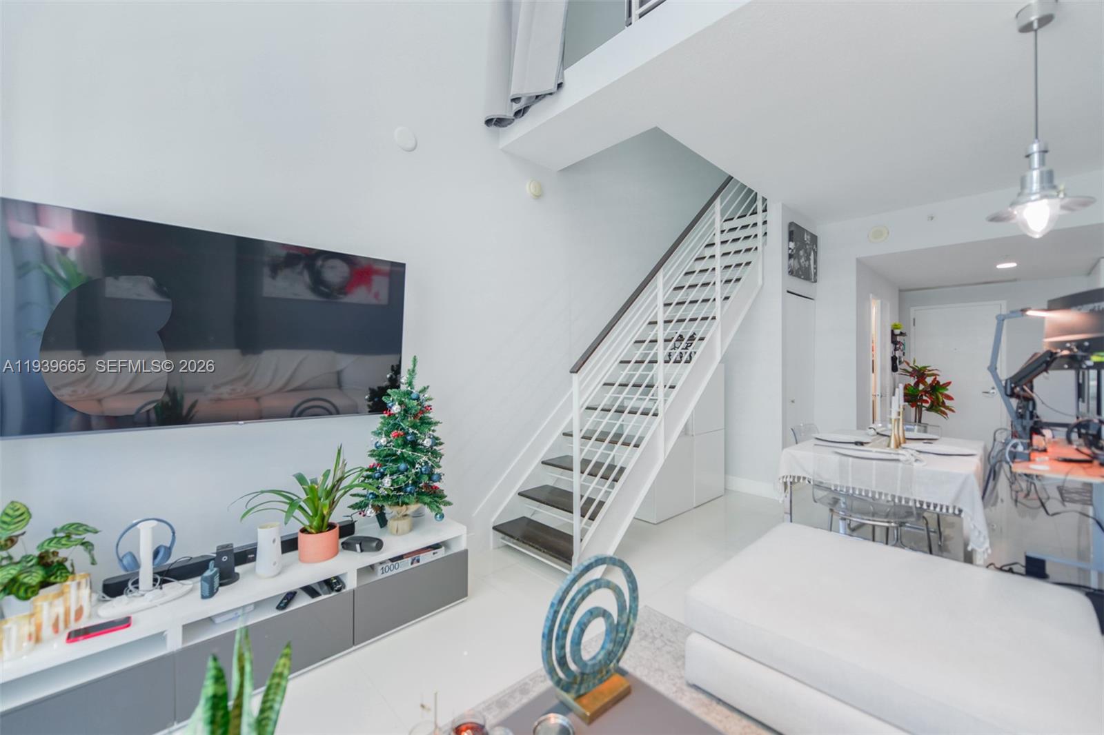 60 Southwest 13th Street, Unit 2404 Miami, FL 33130 - Photo 4 of 28 a view of entryway with livingroom and furniture