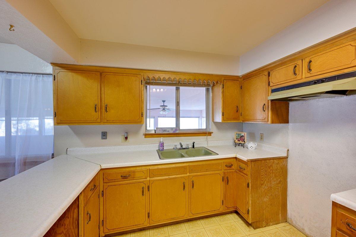 3421 County Road 88C Dunnigan, CA 95937 - Photo 9 of 22 a kitchen with sink cabinets and window