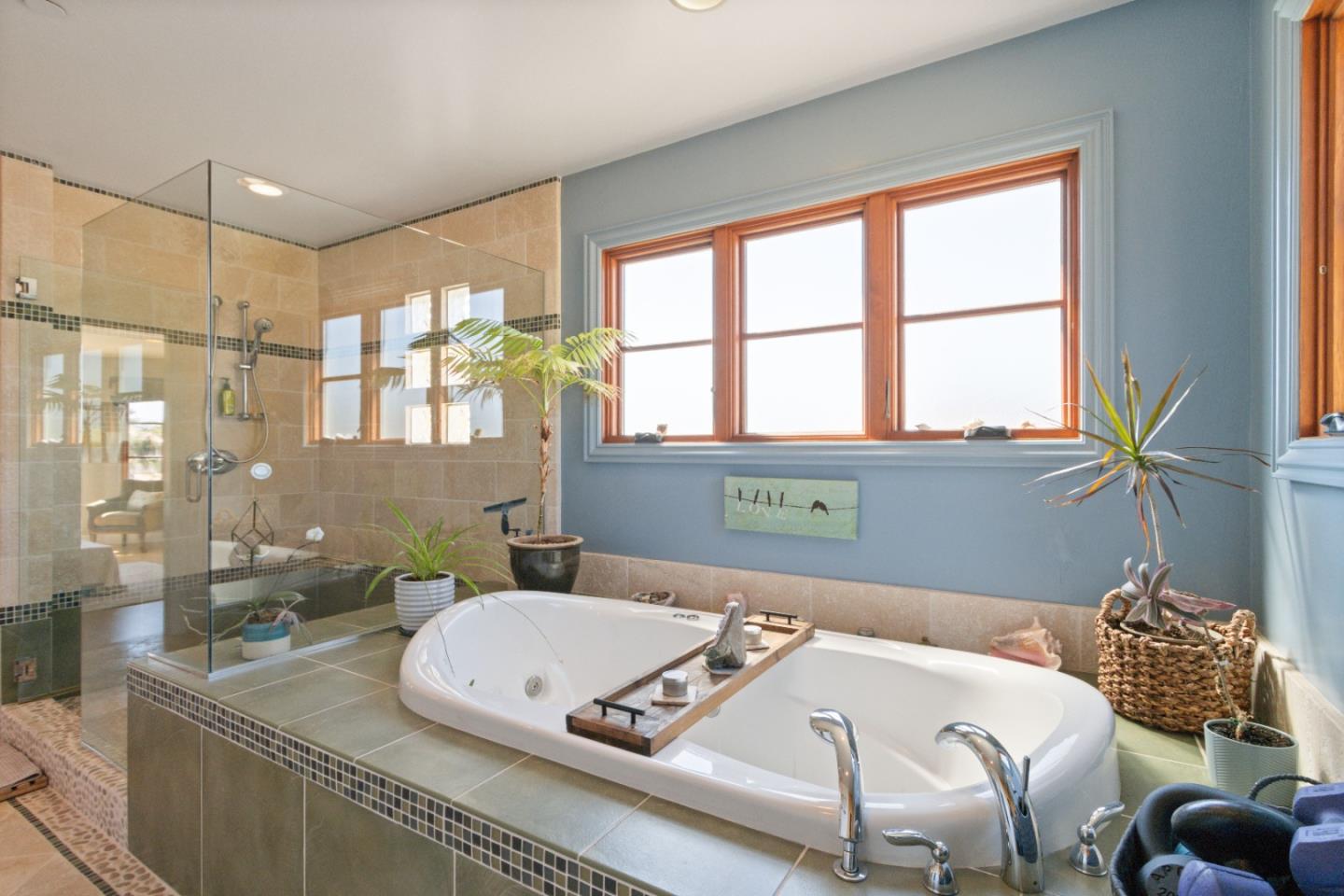 116 Monterey Street Santa Cruz, CA 95060 - Photo 32 of 61 a bed sitting in a bedroom next to a window