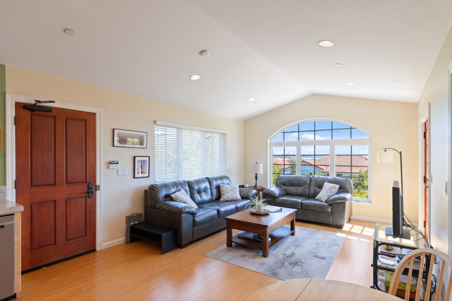 116 Monterey Street Santa Cruz, CA 95060 - Photo 43 of 61 a living room with furniture a rug and a window