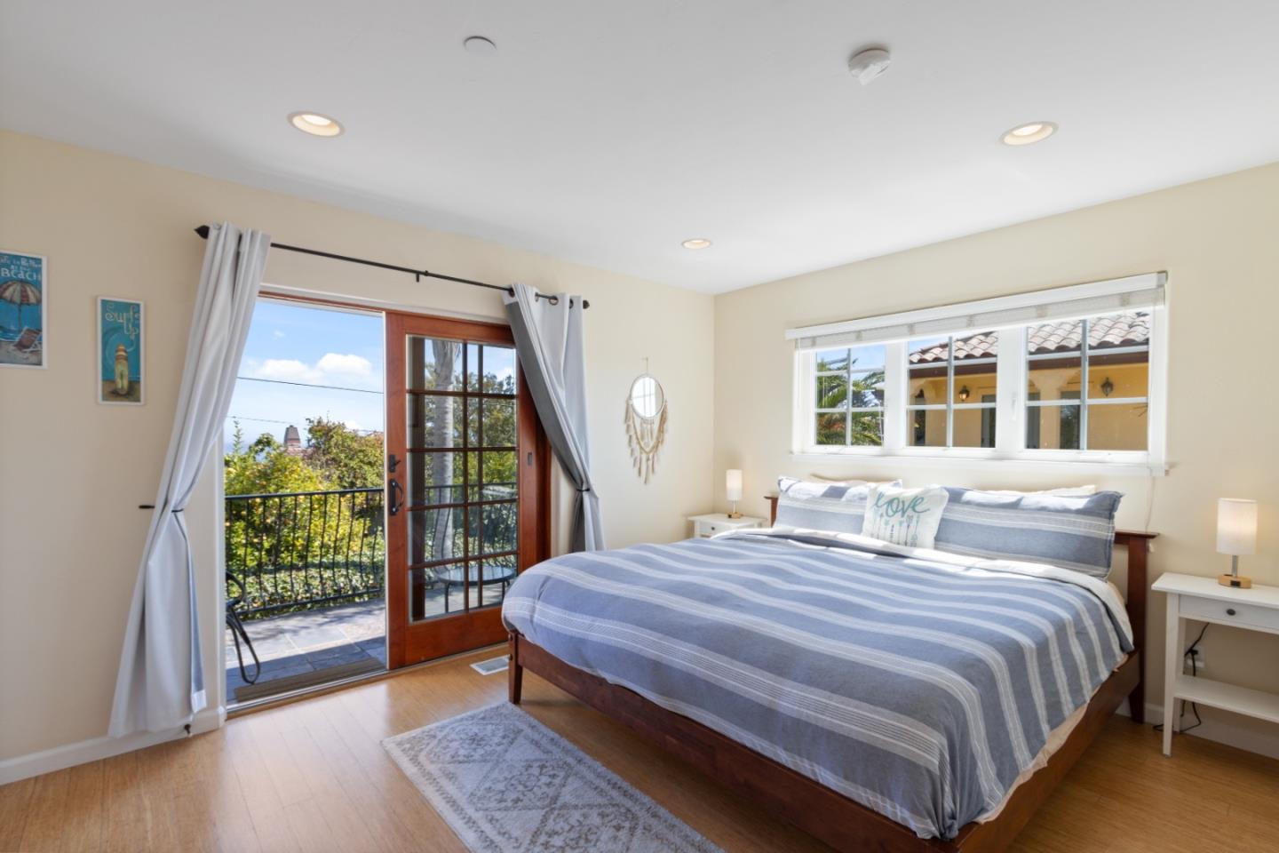 116 Monterey Street Santa Cruz, CA 95060 - Photo 50 of 61 a bedroom with a large bed and a large window