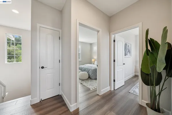 a bedroom with bed and a window