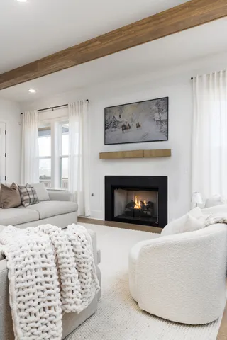 a spacious bathroom with a double vanity sink a mirror and a bathtub