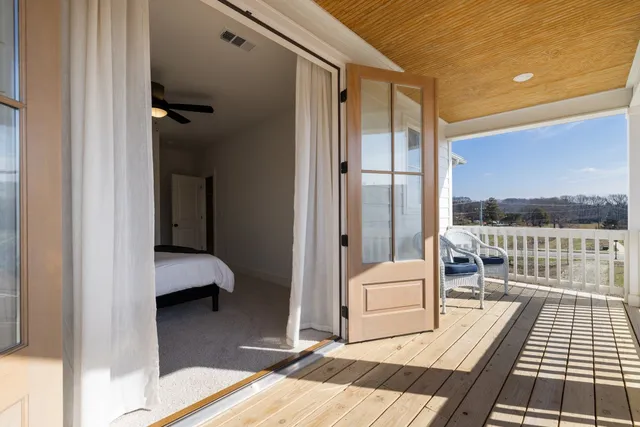 a view of a city with lawn chairs