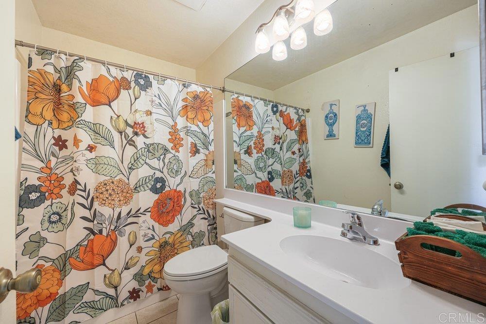 10385 Seth Way Santee, CA 92071 - Photo 25 of 33 a bathroom with a sink and toilet