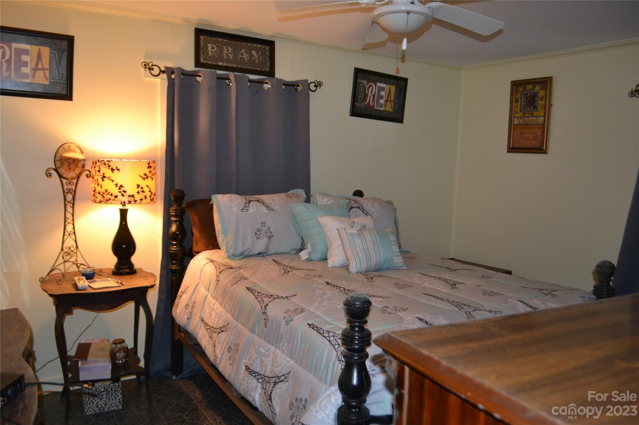 147 Gabriel Street Rutherfordton, NC 28139 - Photo 19 of 29 a bedroom with a bed and a table in it