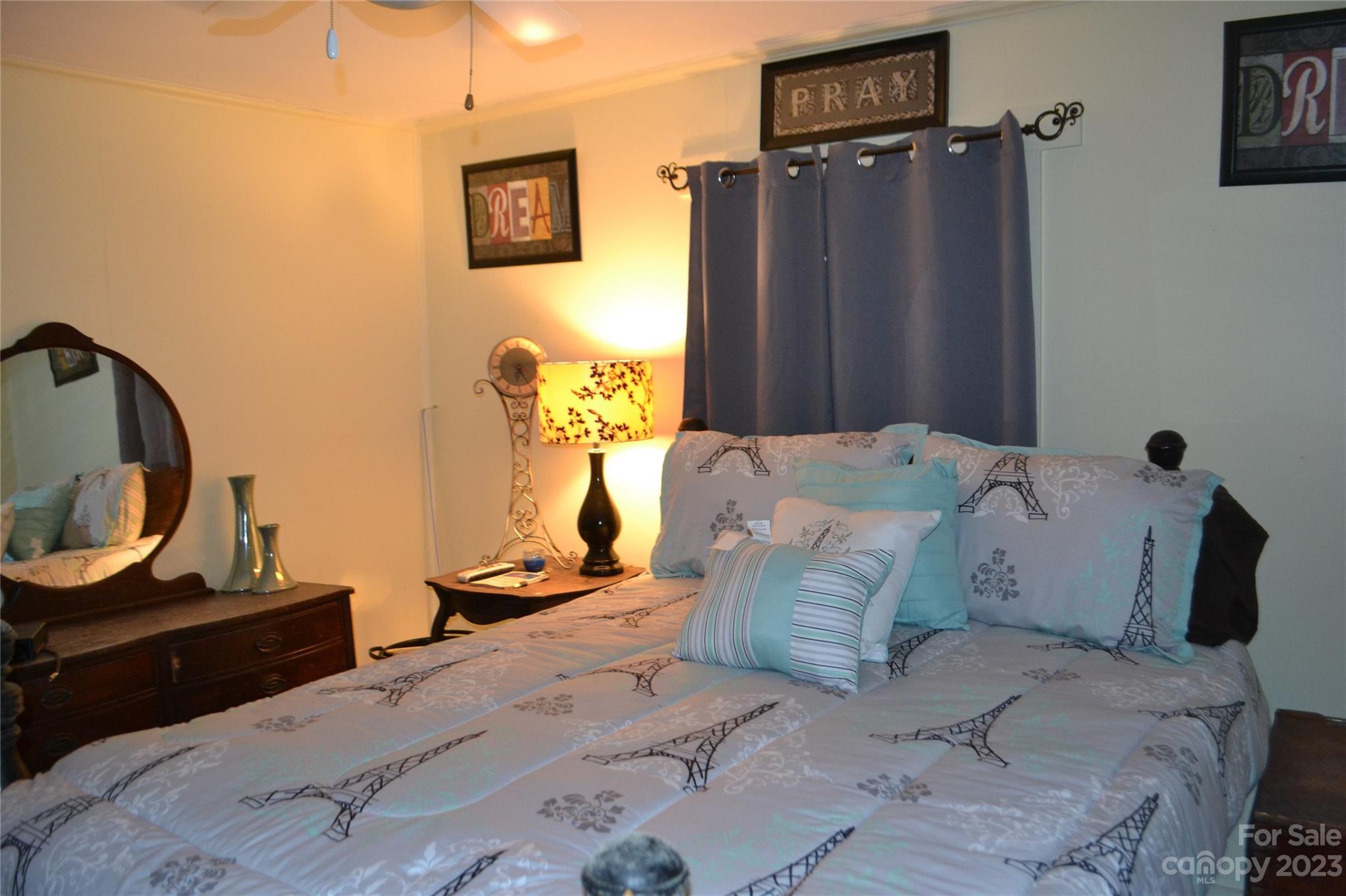 147 Gabriel Street Rutherfordton, NC 28139 - Photo 20 of 29 a bedroom with a bed and a dresser