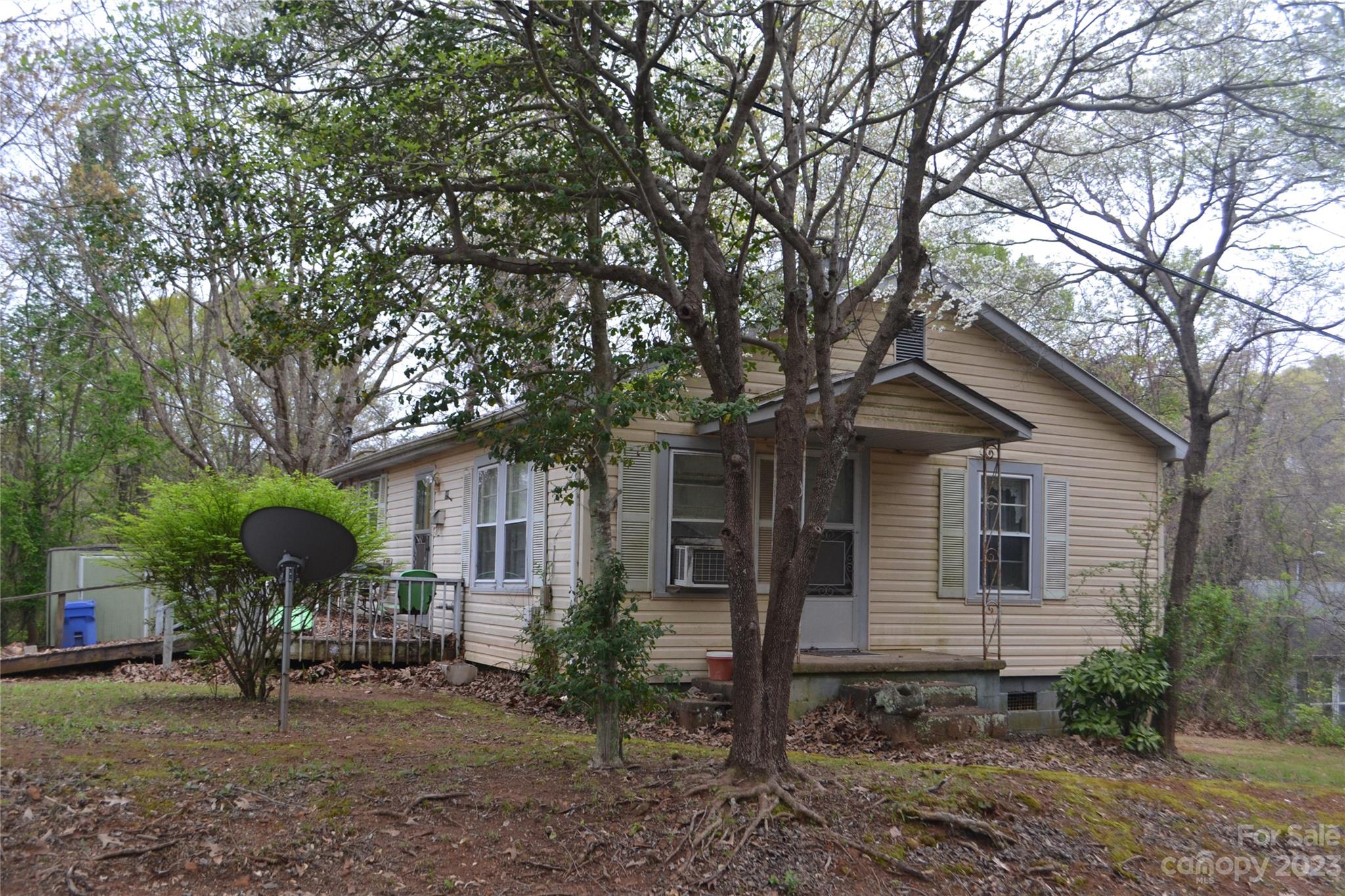 147 Gabriel Street Rutherfordton, NC 28139 - Photo 2 of 29 a front view of a house with garden