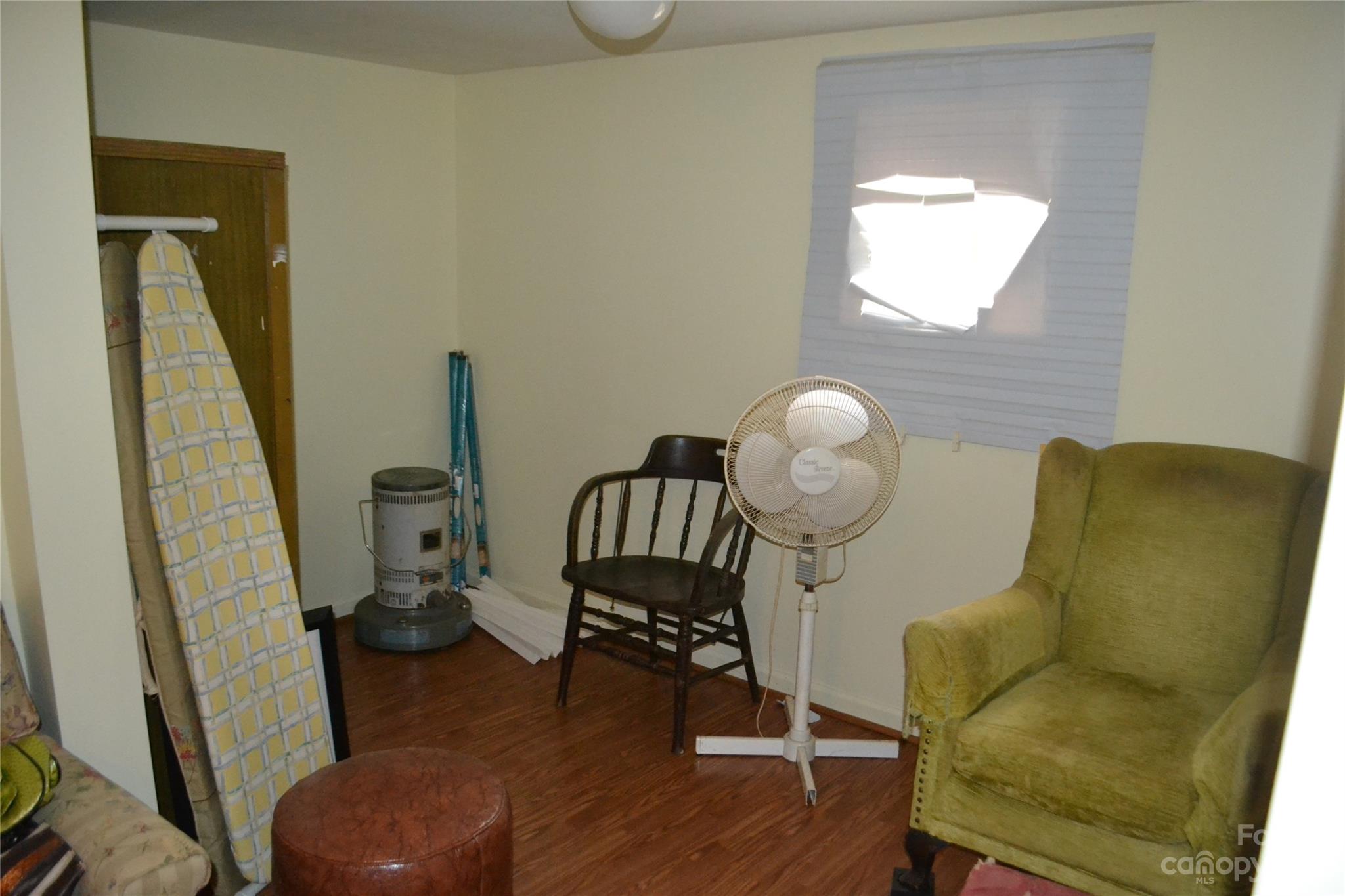 147 Gabriel Street Rutherfordton, NC 28139 - Photo 25 of 29 a living room with furniture and a wooden floor