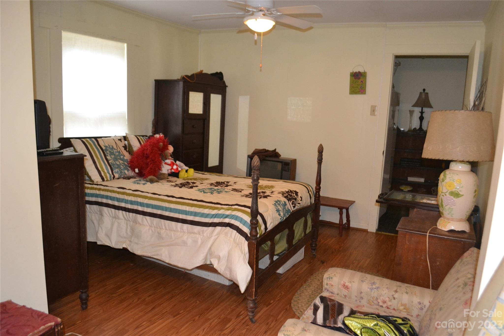 147 Gabriel Street Rutherfordton, NC 28139 - Photo 27 of 29 a bed room with a bed window and a chair