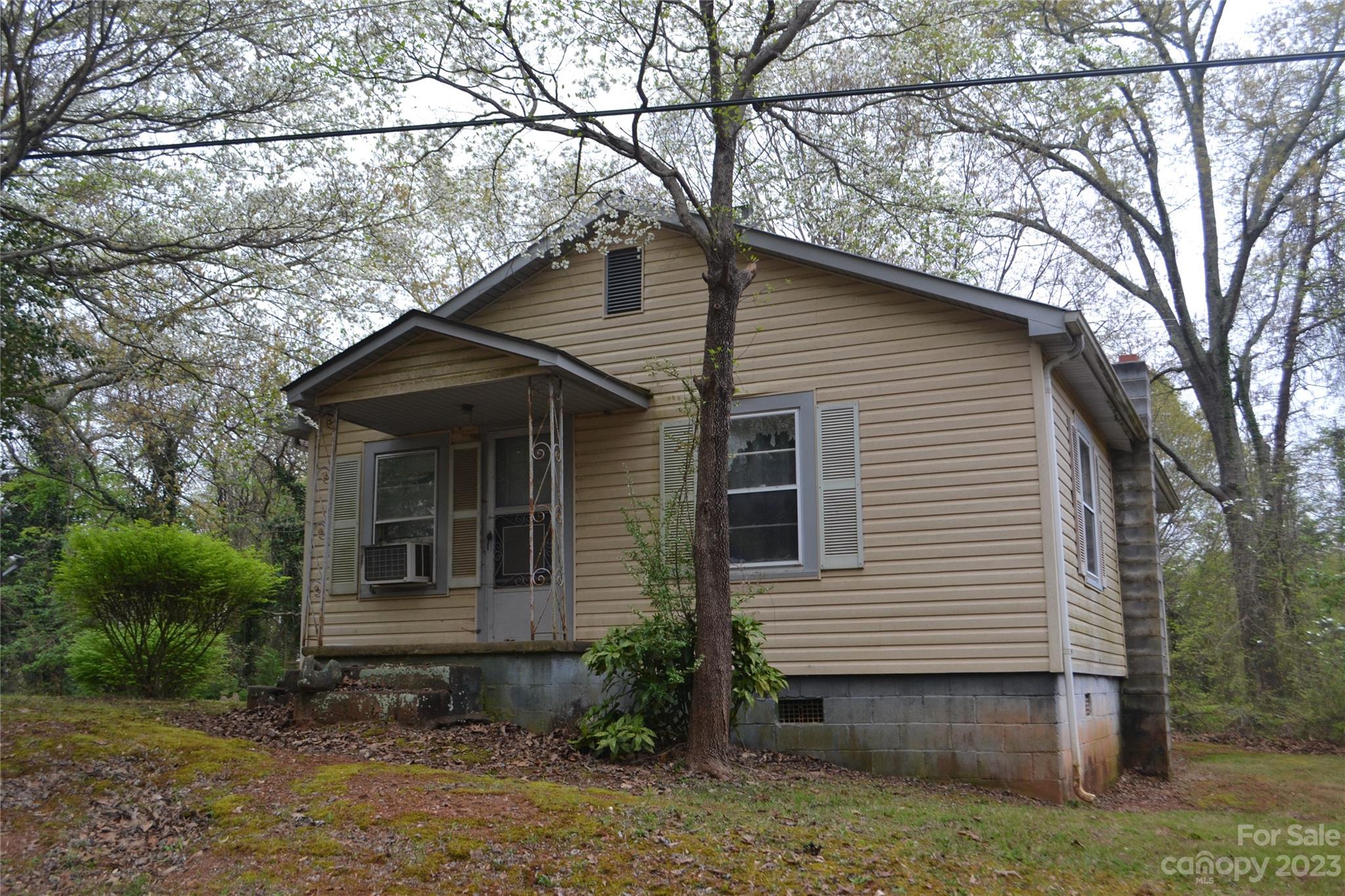 147 Gabriel Street Rutherfordton, NC 28139 - Photo 3 of 29 a front view of a house with garden