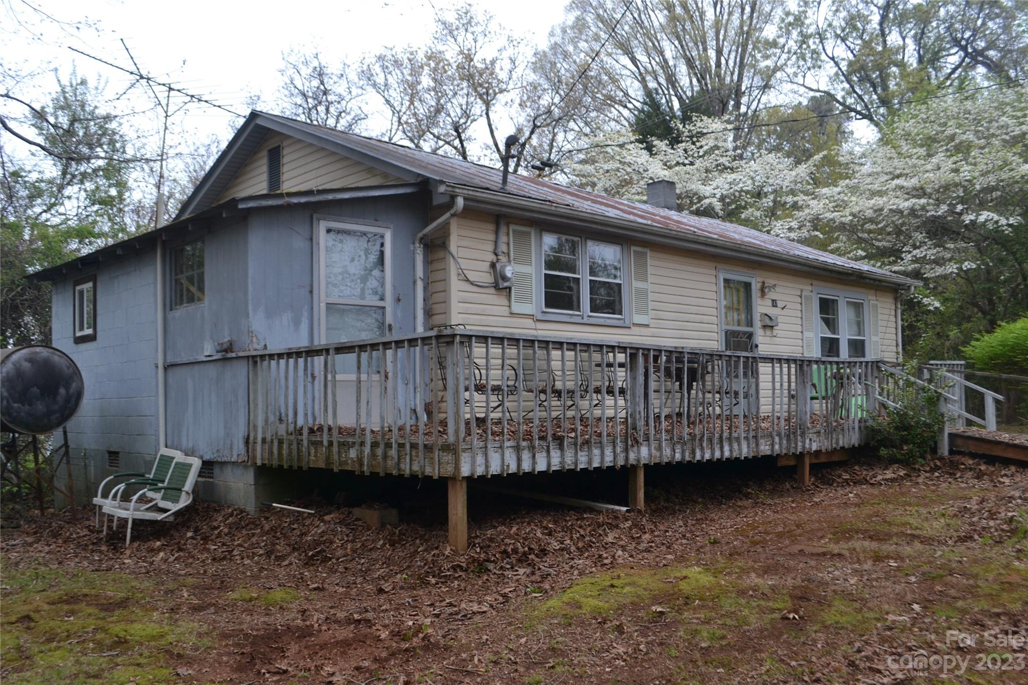 147 Gabriel Street Rutherfordton, NC 28139 - Photo 10 of 29 a view of a house with a yard and sitting area