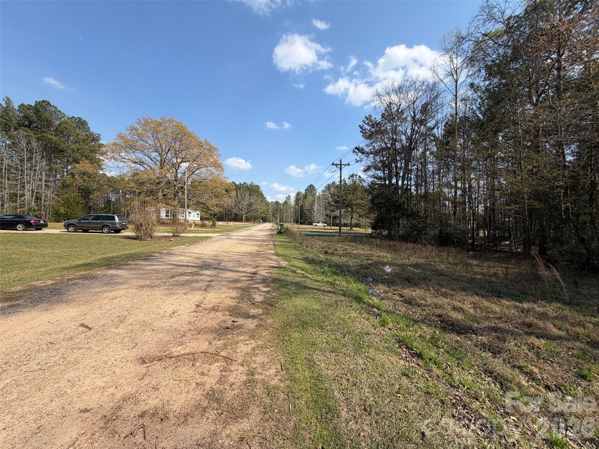 0 Crawford Road Fort Lawn, SC 29714 - Photo 4 of 5 a view of road with large trees