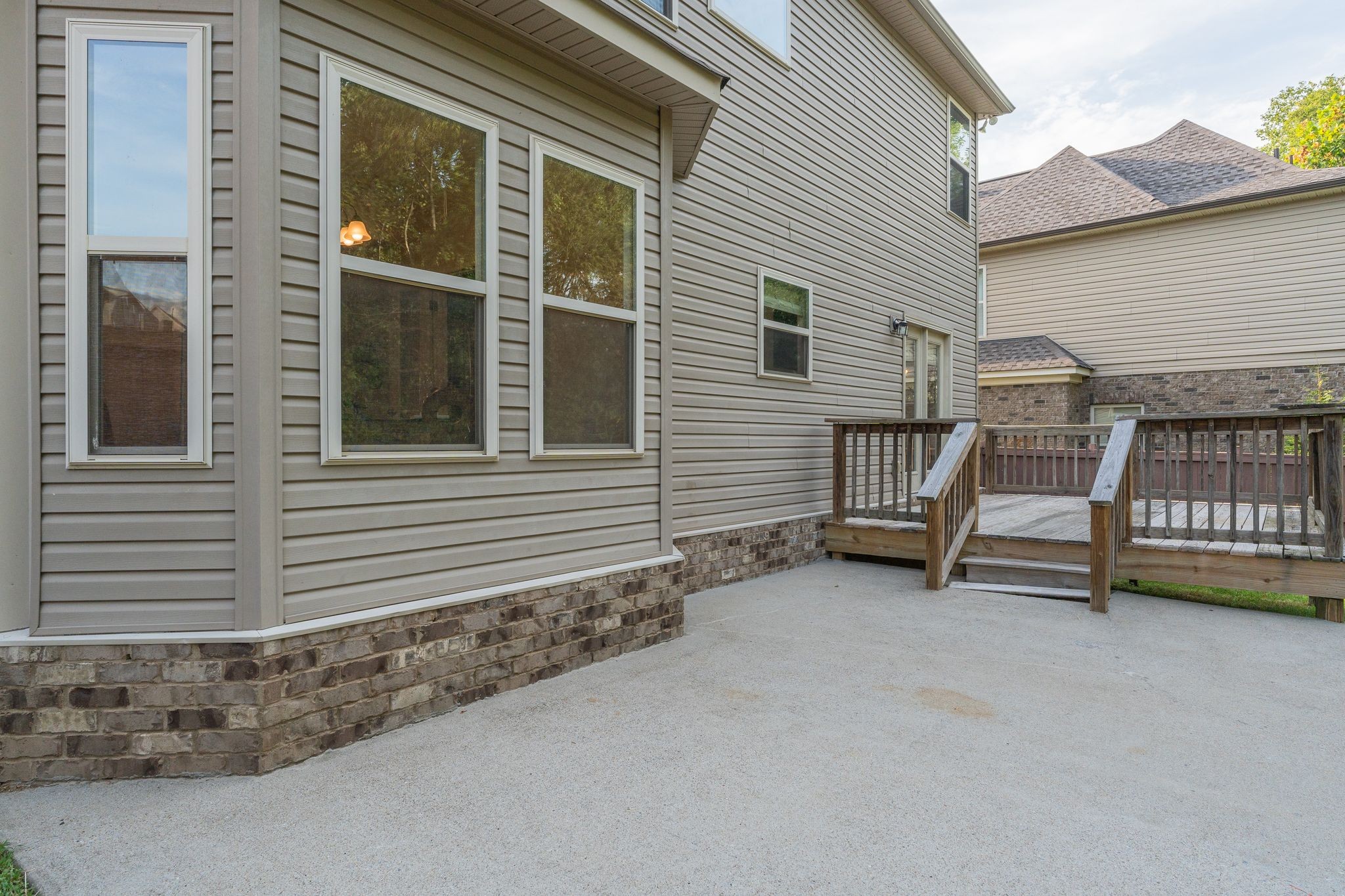 976 Legacy Park Road Mount Juliet, TN 37122 - Photo 27 of 33 19'x12' concrete patio next to deck - lots of room to create your outdoor living space!