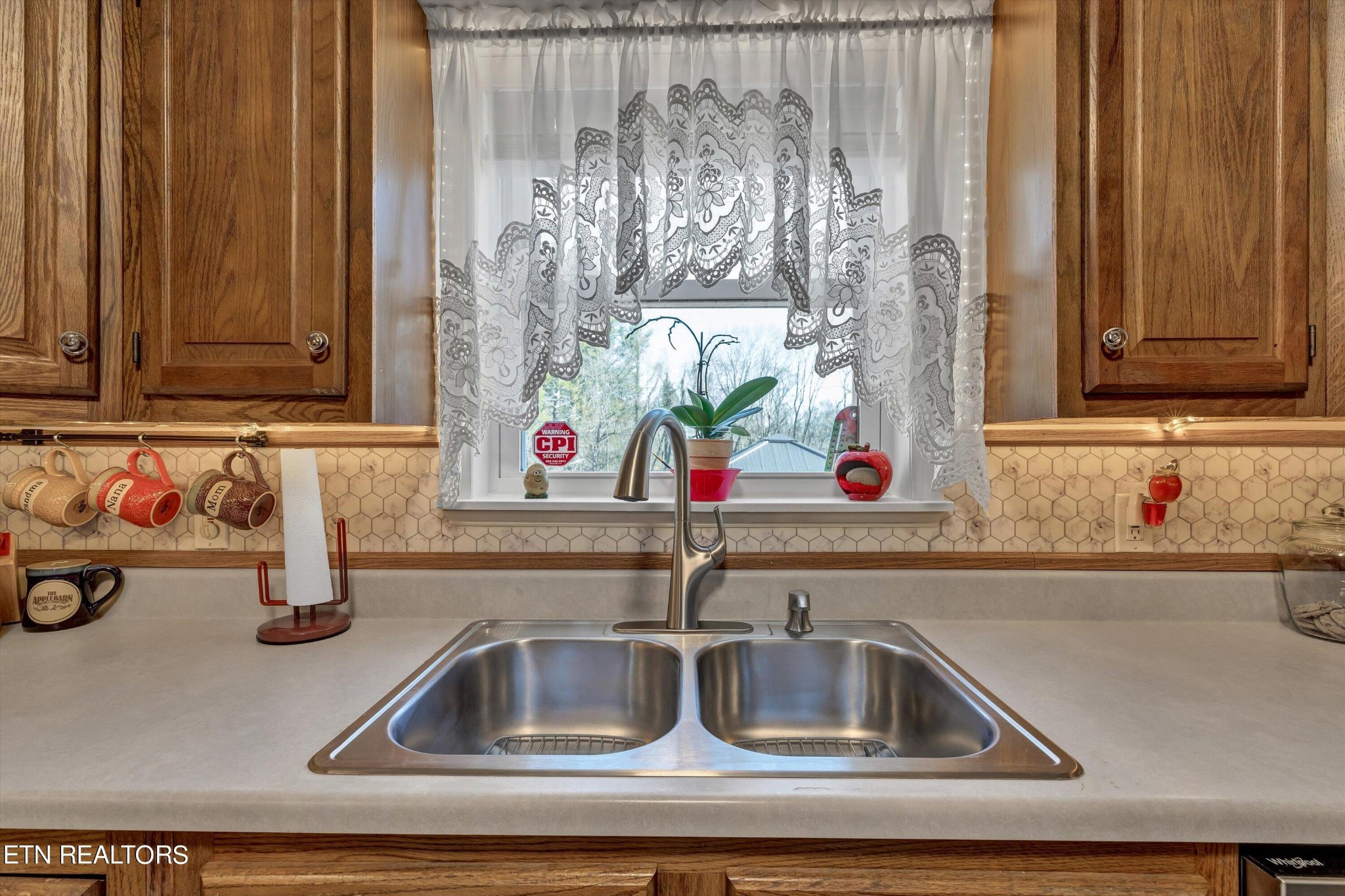 116 Salem Road Oak Ridge, TN 37830 - Photo 13 of 28 a kitchen with a sink and a window