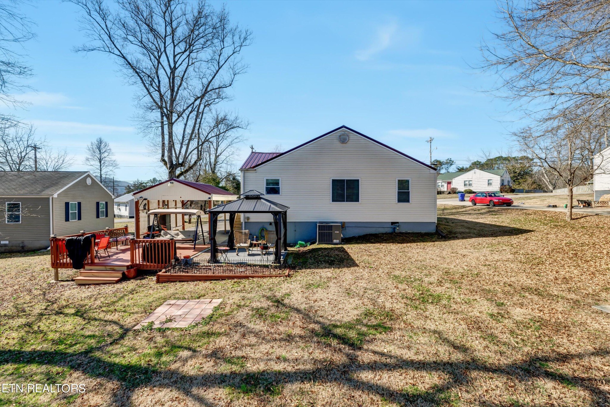 116 Salem Road Oak Ridge, TN 37830 - Photo 26 of 28 a front view of a house with a yard covered in snow