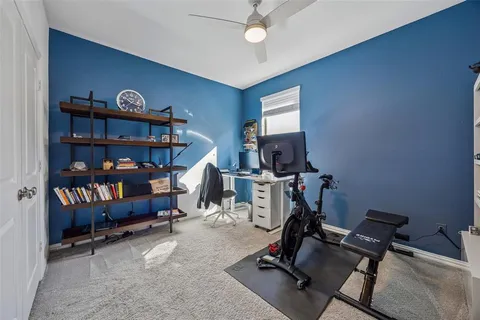 a bathroom with a toilet a sink and a mirror