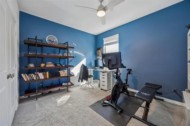 a bathroom with a toilet a sink and a mirror