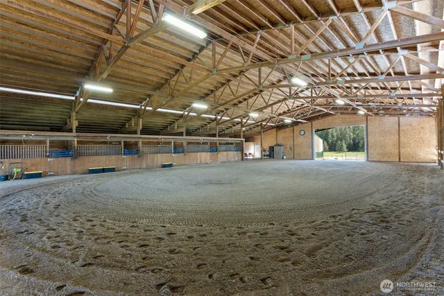 a view of a empty room with wooden fence