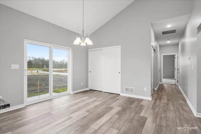 a view of livingroom with hardwood floor and window