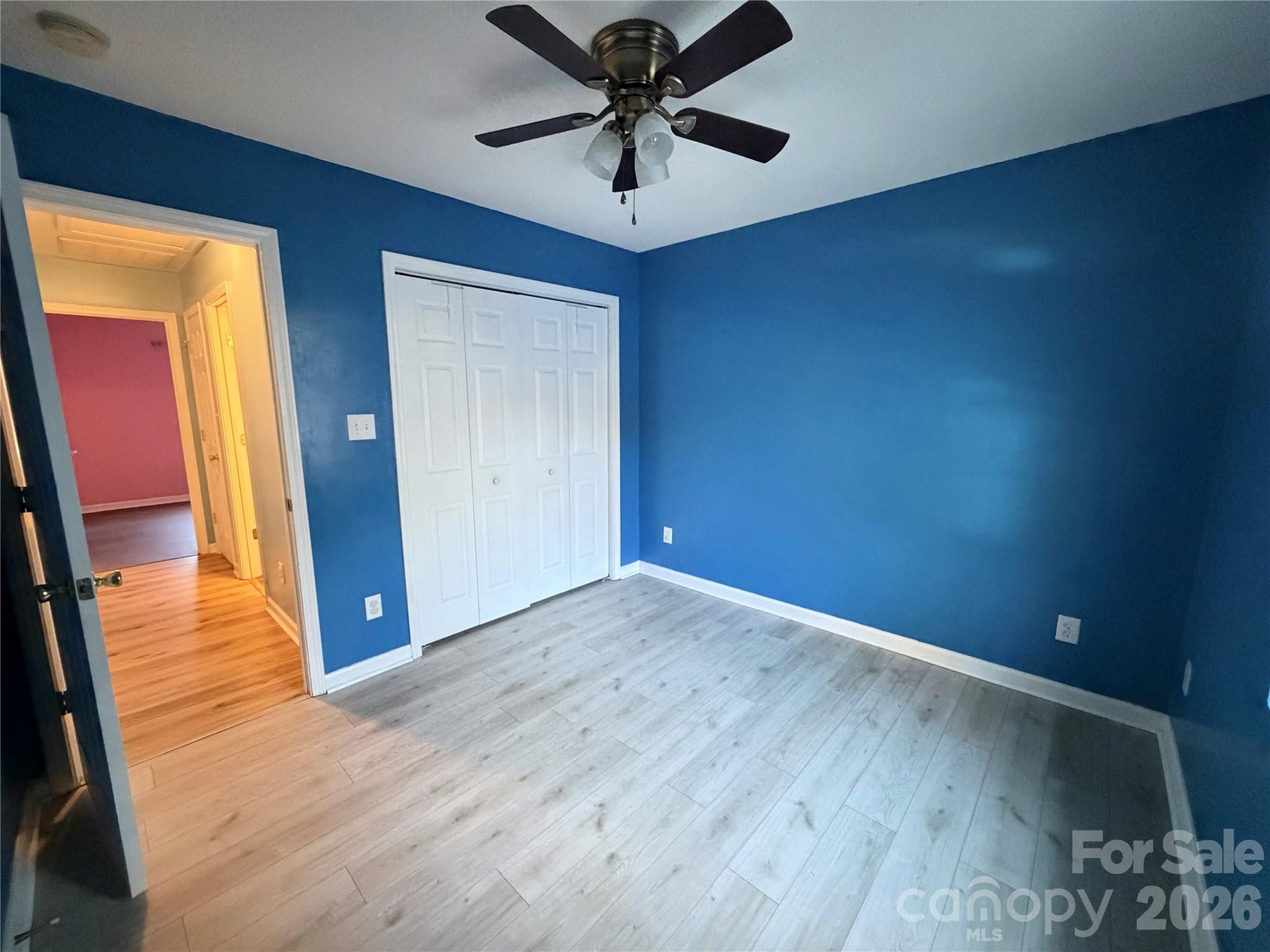 308 Springhill Lane Maiden, NC 28650 - Photo 13 of 21 wooden floor in an empty room with a window