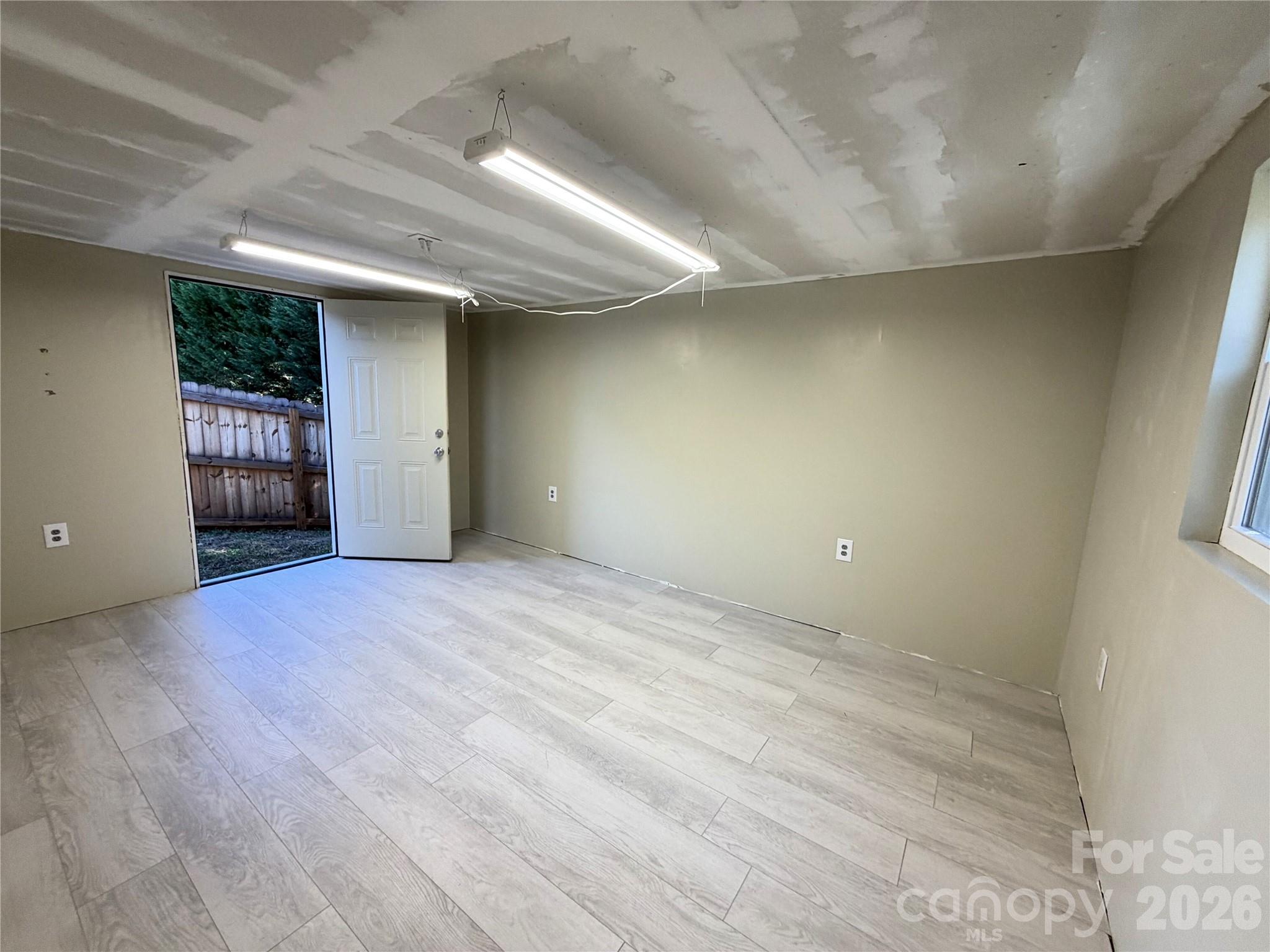 308 Springhill Lane Maiden, NC 28650 - Photo 20 of 21 an empty room with windows