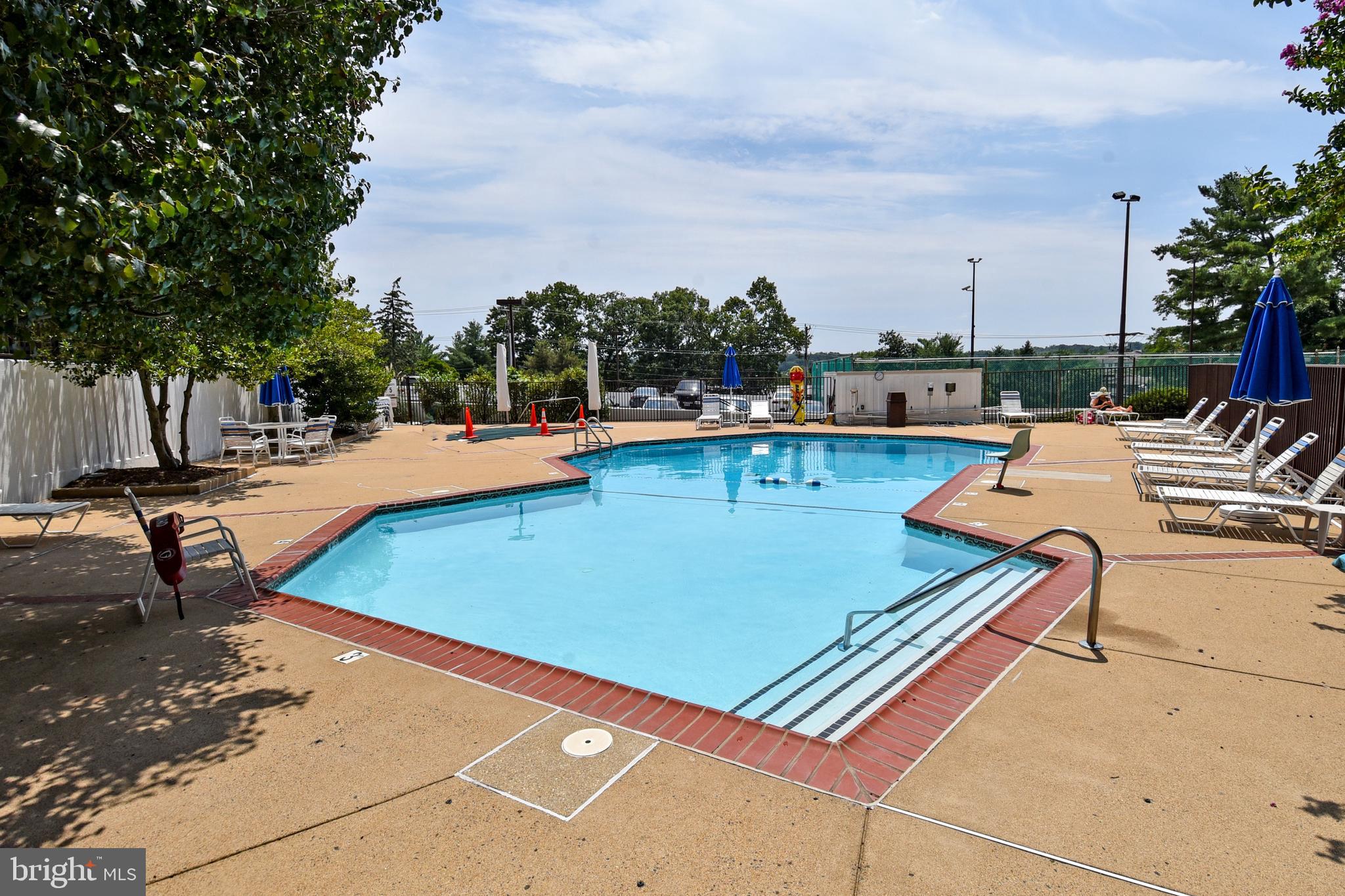 6101 Edsall Road, Unit 1706 Alexandria, VA 22304 - Photo 28 of 40 an outdoor space with pool and furniture