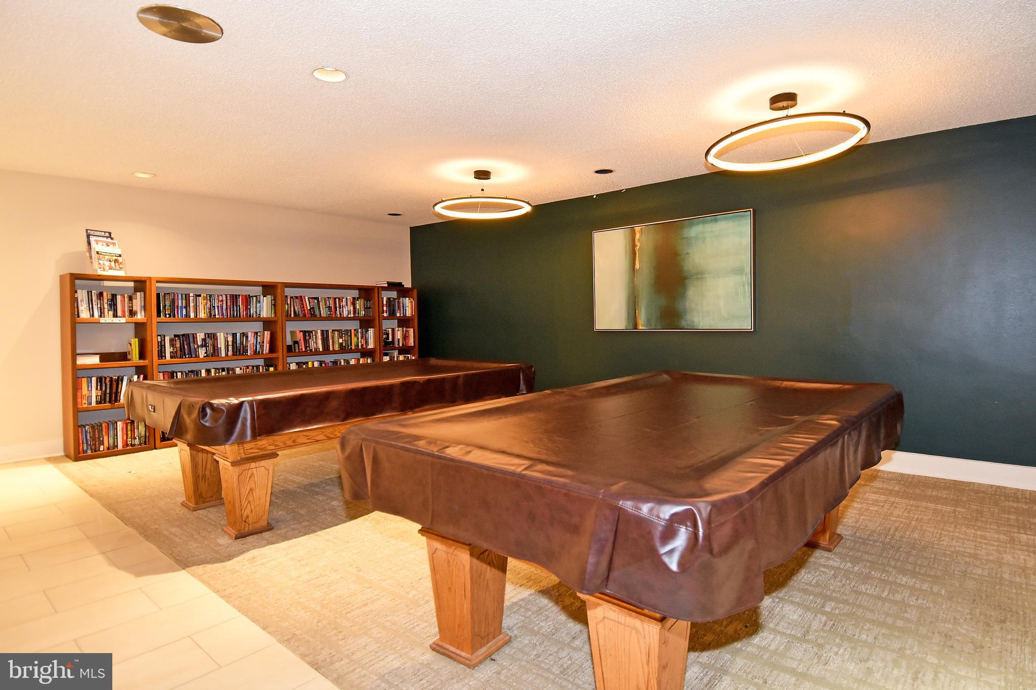 6101 Edsall Road, Unit 1706 Alexandria, VA 22304 - Photo 35 of 40 a dining room with table and chairs