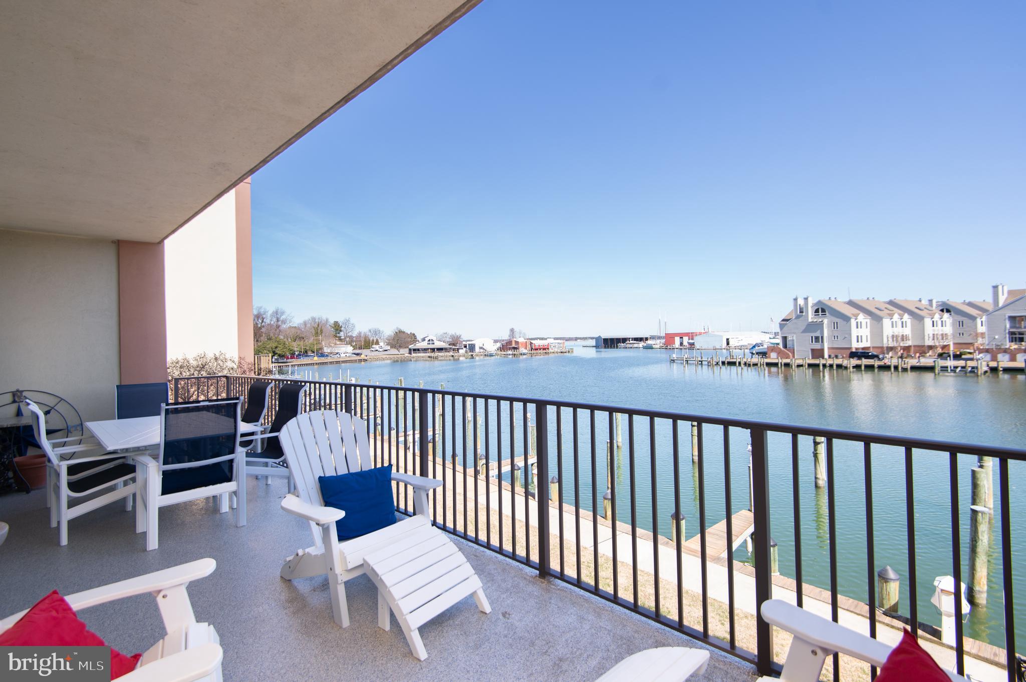 304 Academy Street, Unit 101 Cambridge, MD 21613 - Photo 3 of 56 a view of a balcony with furniture