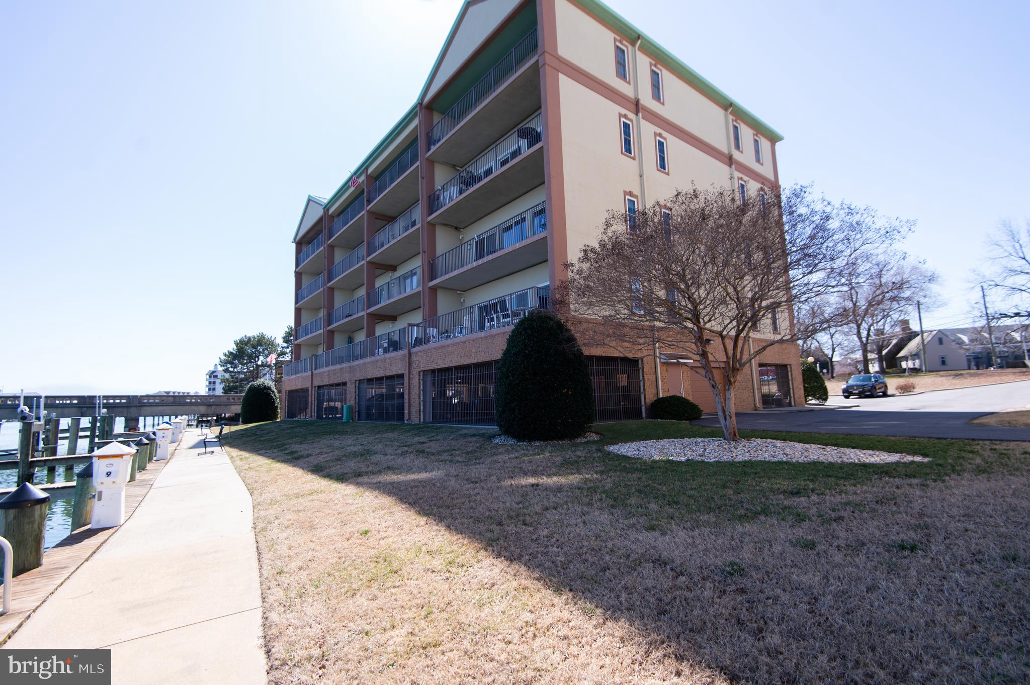 304 Academy Street, Unit 101 Cambridge, MD 21613 - Photo 42 of 56 a view of a house with a yard