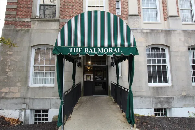 a front view of a house with a garage