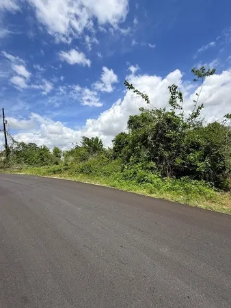 a view of a house with a street
