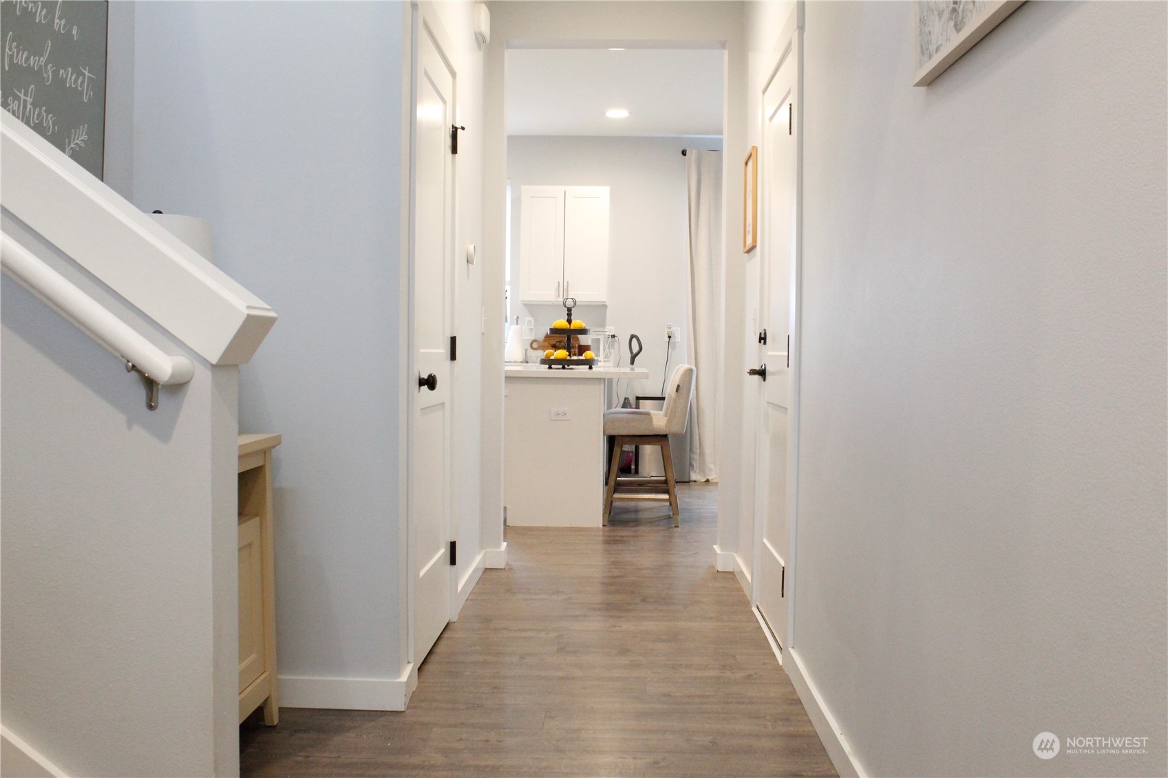 175 London Lane Chehalis, WA 98532 - Photo 3 of 14 a view of a hallway with wooden floor and closet