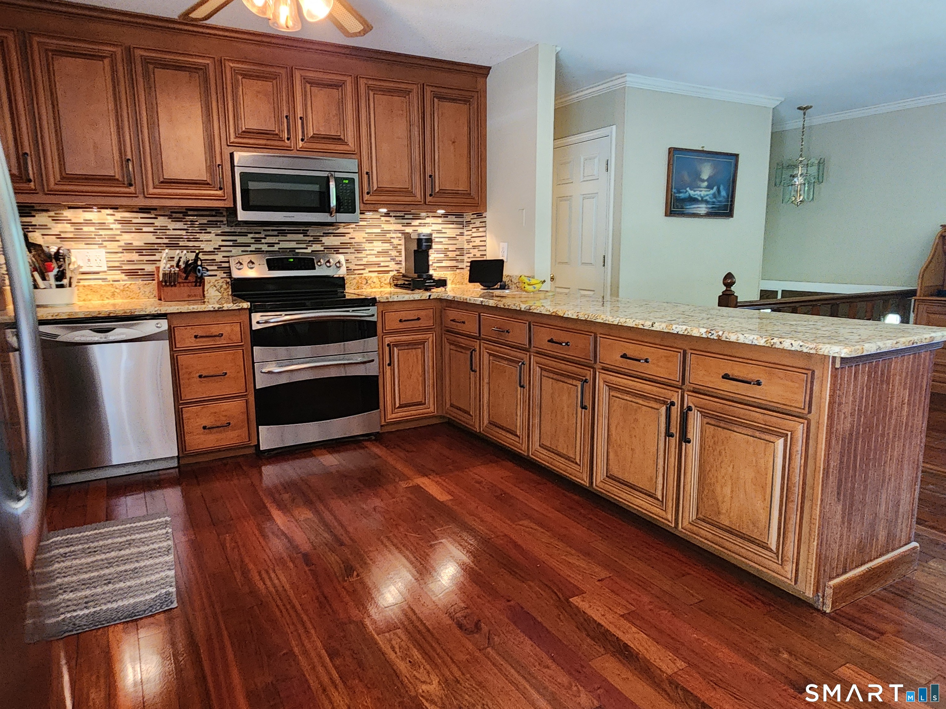 45 Nepaug Road Burlington, CT 06013 - Photo 6 of 30 Loads of cabinets and counter space. Granite counter tops.