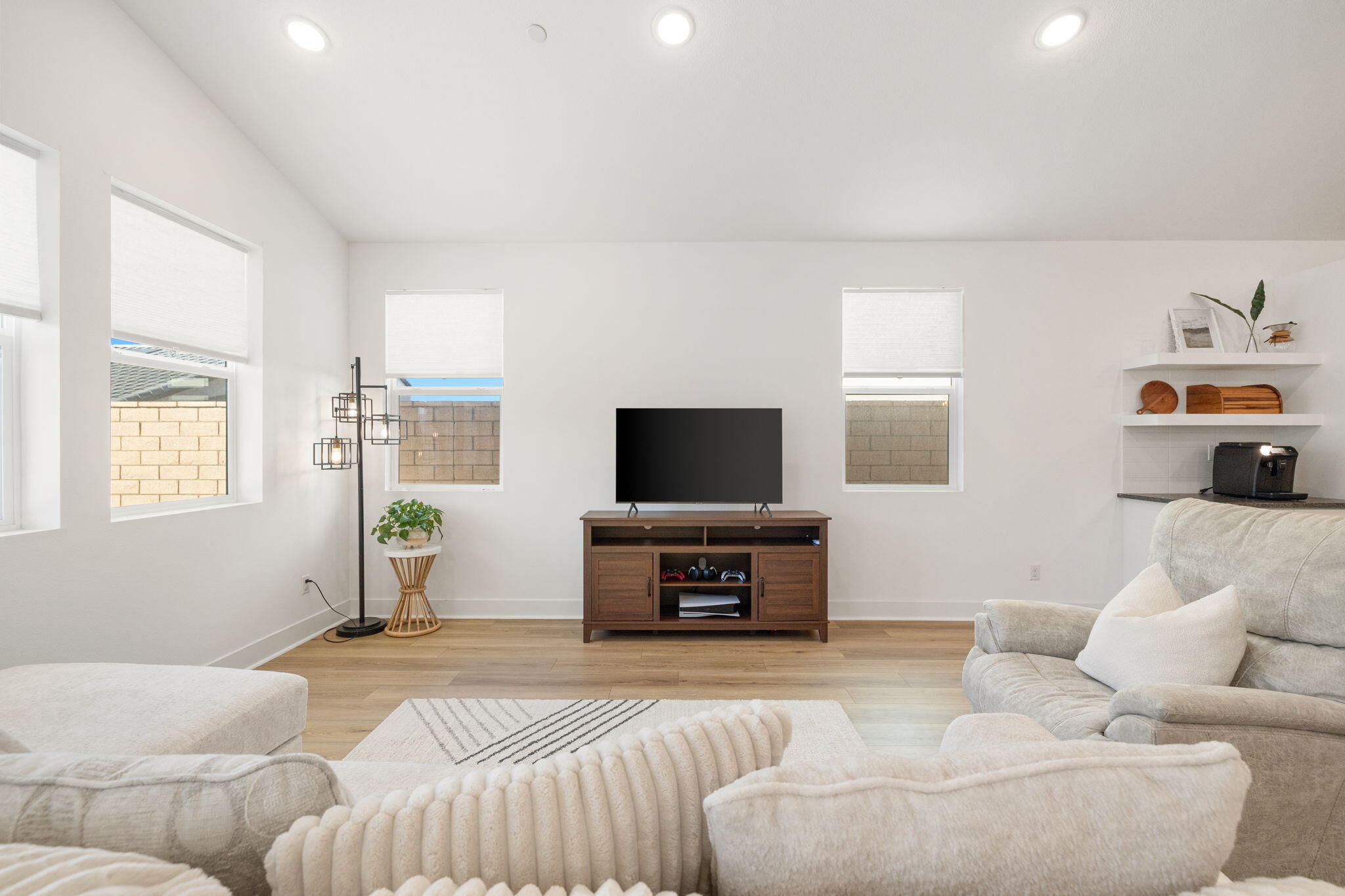 42501 Solicio Way Indio, CA 92203 - Photo 13 of 34 a bedroom with furniture and a flat screen tv