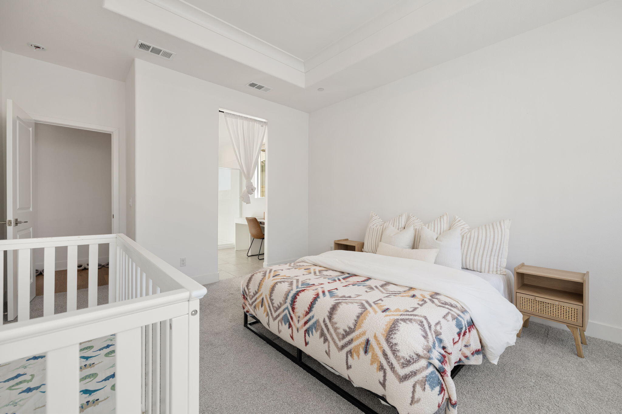 42501 Solicio Way Indio, CA 92203 - Photo 16 of 34 a bedroom with a bed and a window