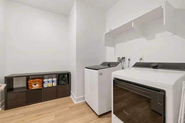 a kitchen with a stove and a microwave