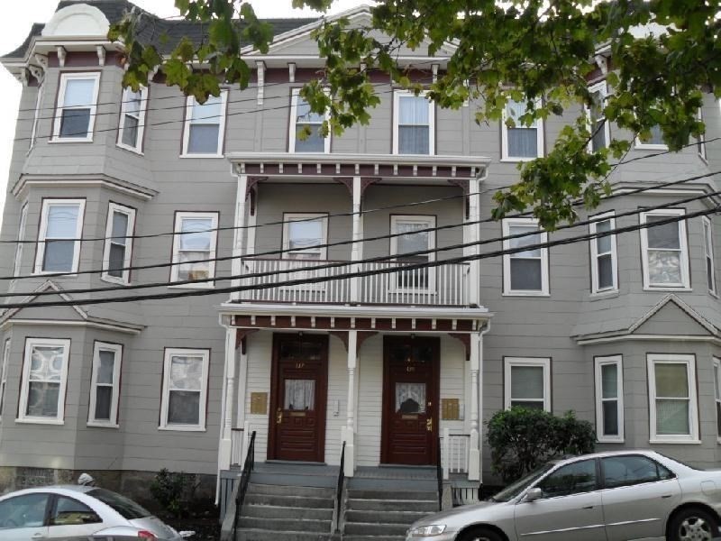 137 Paul Gore Street, Unit 2 Boston, MA 02130 - Photo 11 of 11 a front view of a building with balcony