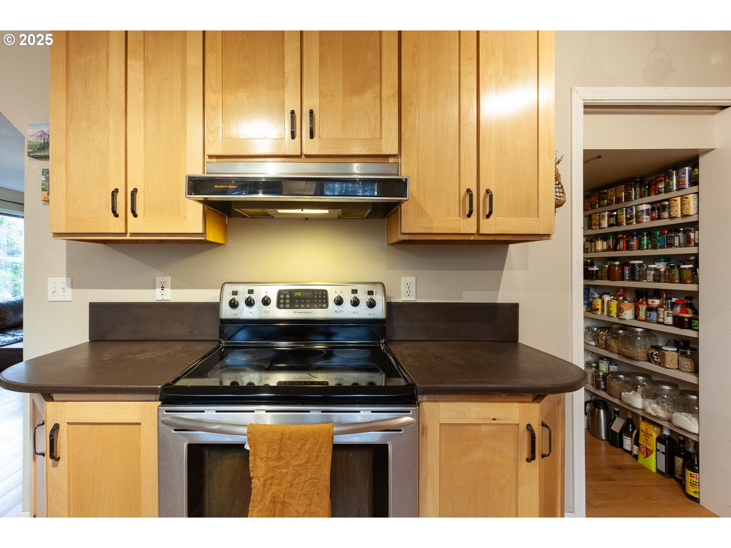 817 Devon Court Hood River, OR 97031 - Photo 15 of 42 a stove top oven sitting inside of a kitchen