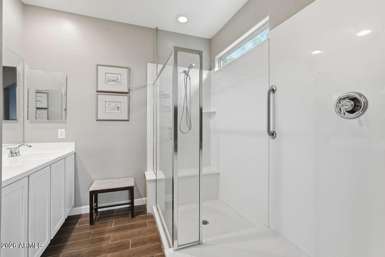 23602 West Ripple Road Buckeye, AZ 85326 - Photo 24 of 38 a bathroom with a shower and a sink