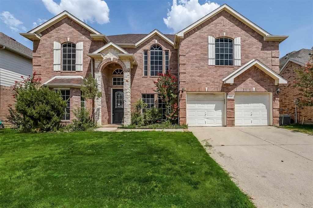 7808 Pirate Point Circle Arlington, TX 76016 - Photo 1 of 1 a front view of a house with a garden