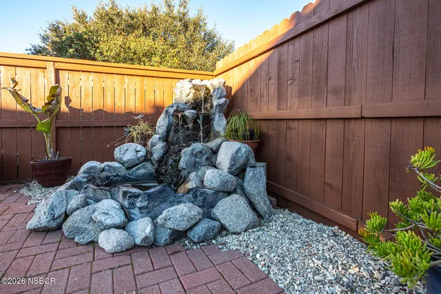 a view of a house with a street
