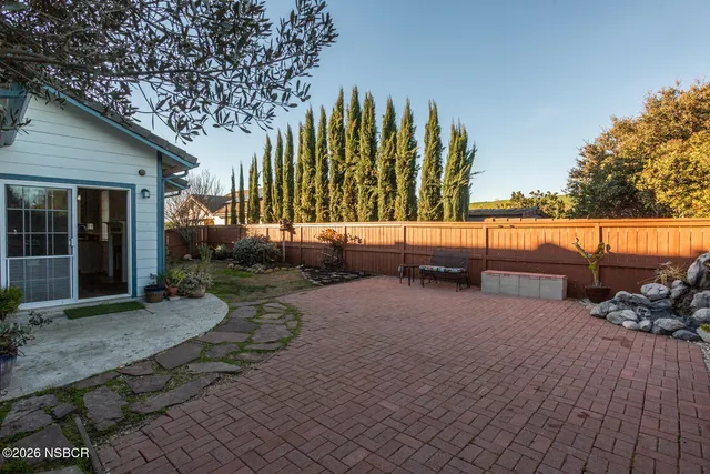 a view of a yard with an outdoor space