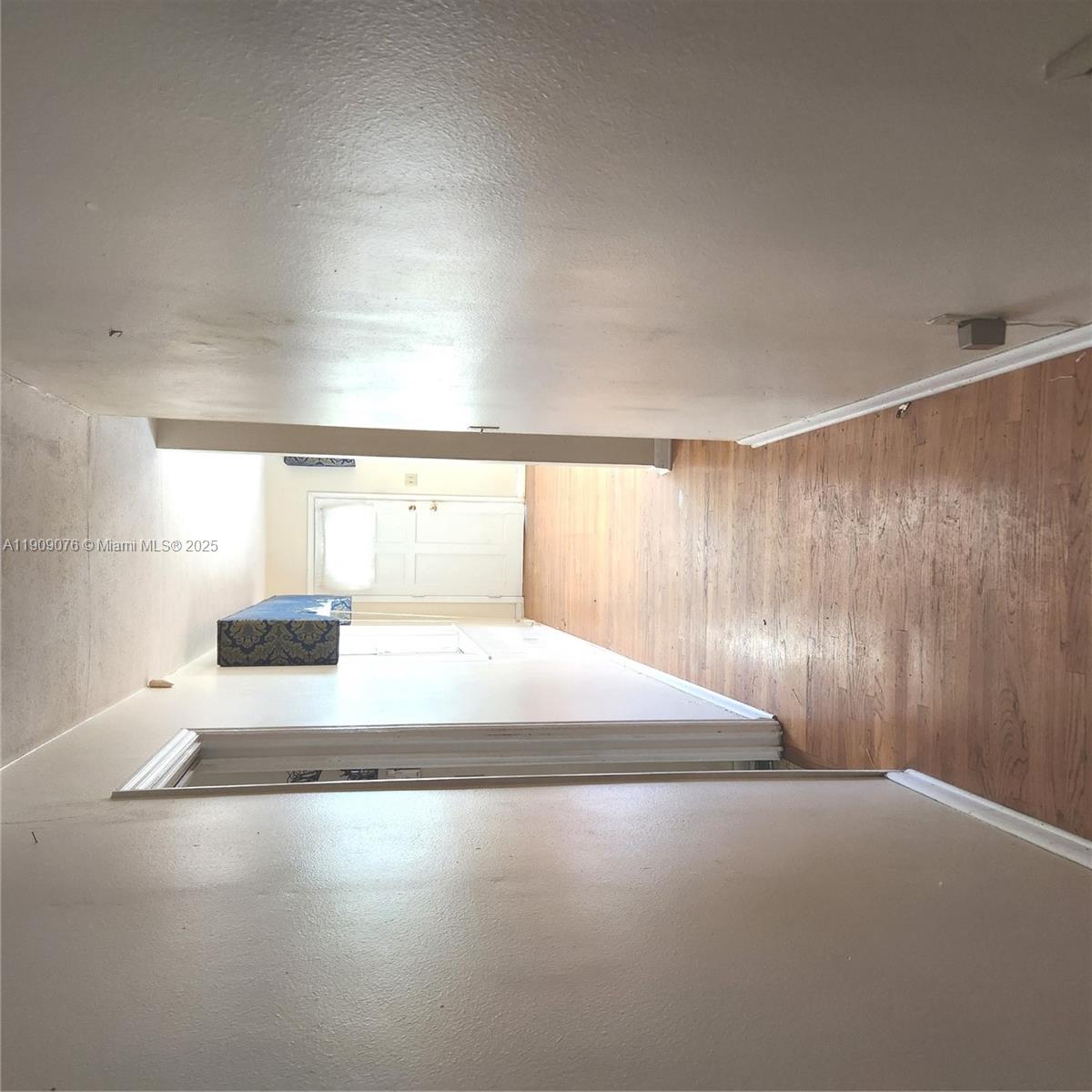 1547 West 10th Street Riviera Beach, FL 33404 - Photo 10 of 10 a bedroom with a bed and a window