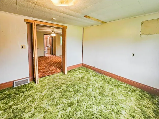 a view of an empty room with window