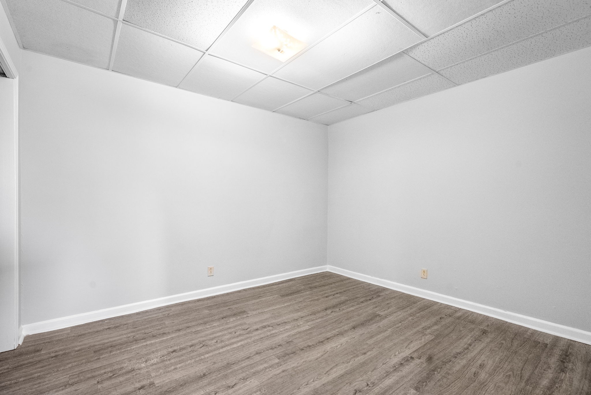 1600 Paradise Hill Road, Unit B Clarksville, TN 37043 - Photo 14 of 20 a view of an empty room with wooden floor